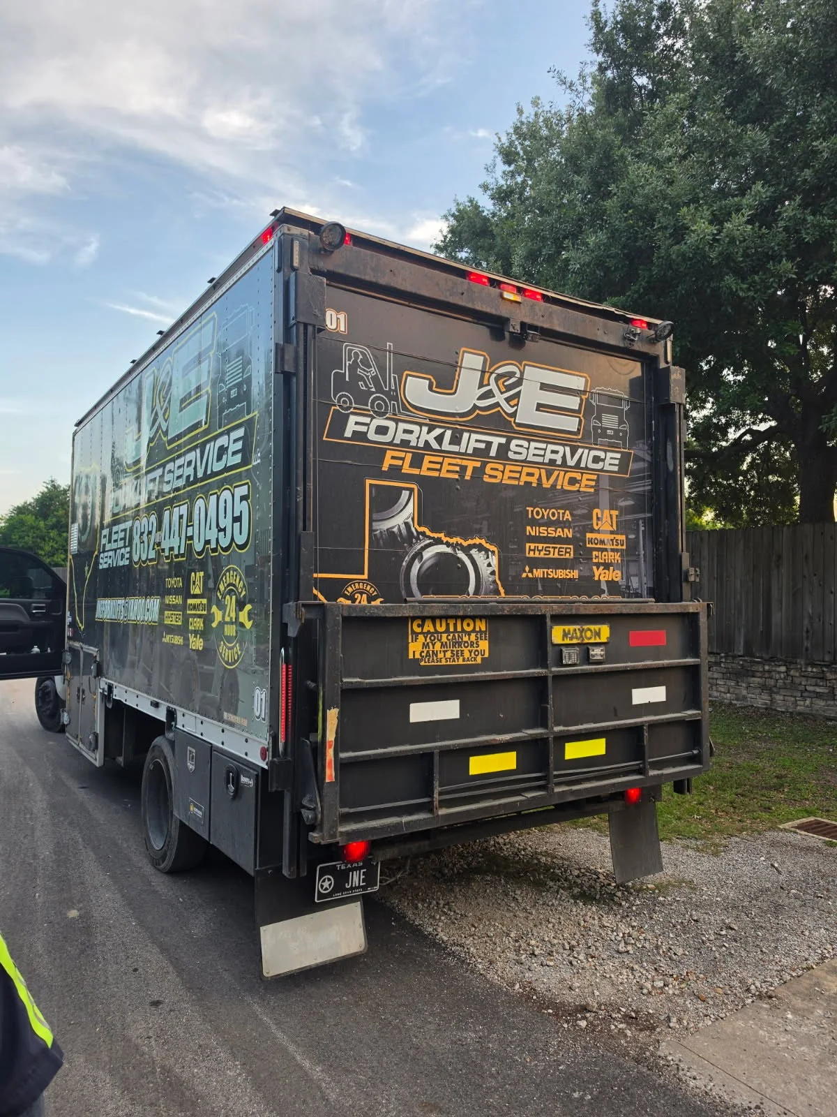 J&E Forklift Service truck rear view
